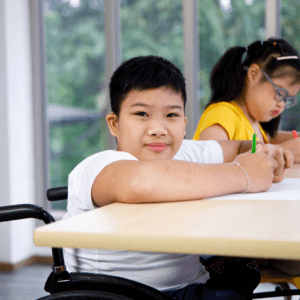 Young disabled school boy PA Pool